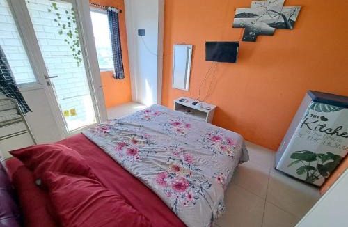 Karawang Hotel | OYO Life 93139 Apartemen Grand Sentraland By Evi