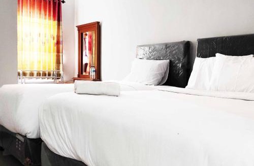 Oro Oro Ombo Hotel | Pertiwi Homestay Near Museum Angkut Batu Mitra RedDoorz