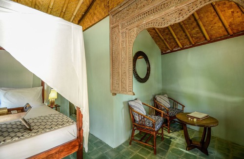 Jasri Resort | Romantic Private Villa facing the pool.Soft aqua handmade tiles and antiques.
