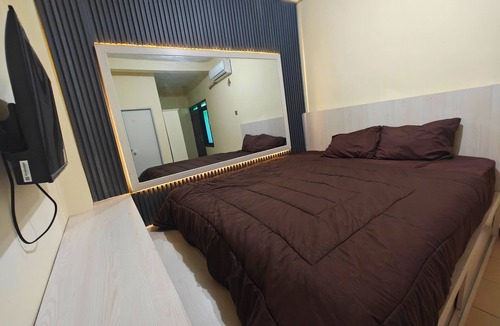 Dinoyo House | Roomy Guesthouse