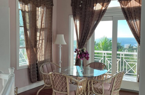 Jessups Village Villa | Royal Palm Villas, #1 Location. Minutes to Pinney's Beach, with AC Bedroom