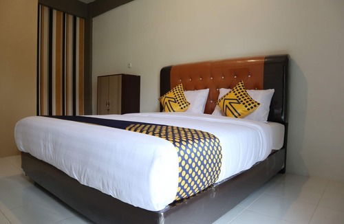 Payakumbuh Hotel | SPOT ON 1772 Hotel Penginapan Cemara Syariah
