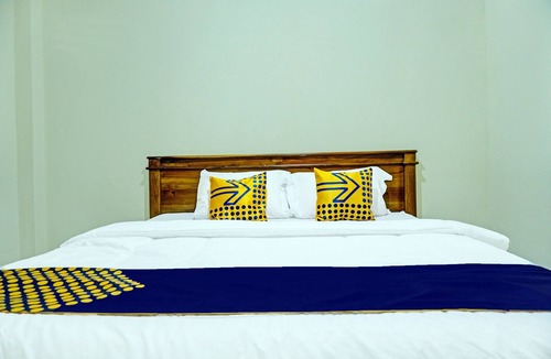 Karya Penggawa Hotel | SPOT ON 92392 Penginapan Vinccent22 Syariah