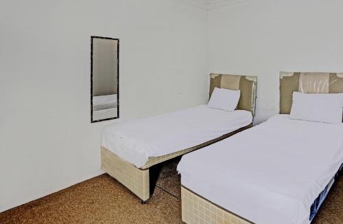 Kotabangun Hotel | SPOT ON 92529 Penginapan Wisma Bintang Syariah Near MTs Al Ma'arif Kota Bangun
