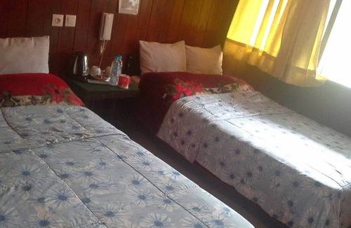 Tengger Caldera Bed & Breakfast | Twin room near edge with view of Mt. Bromo
