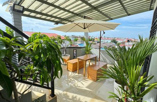 Kabil Hotel | Urbanview Botania Meeting Point Batam by RedDoorz