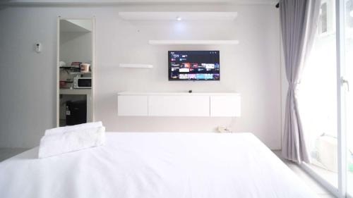 Sidoarjo Apartment | Well Furnished and Homey Studio (No Kitchen) Apartment at Suncity Residence By Travelio