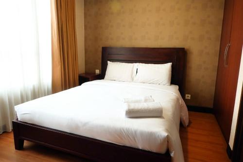 2BR Prestige Essence Dharmawangsa Apartment By Travelio in Jakarta