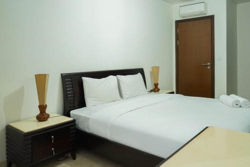 2BR with Study Room at L'Avenue Apartment By Travelio in Jakarta
