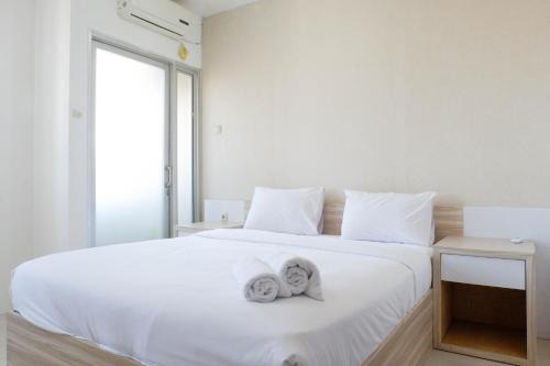 Best Value 1BR at Twin Tower Apartment By Travelio in Surabaya