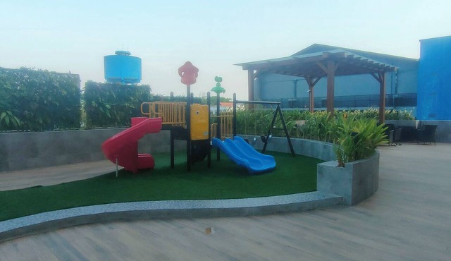 Bright Woody Vibes Studio Room At Suncity Residence Apartment in Sidoarjo
