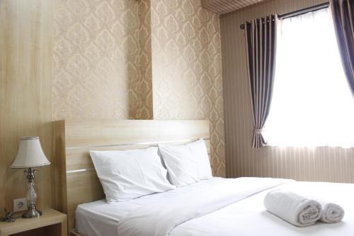 Classic 2BR Apartment at Mekarwangi Square Cibaduyut By Travelio in Bandung