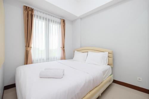 Comfort and Modern 2BR at Royal Heights Apartment By Travelio in Bantarkamang