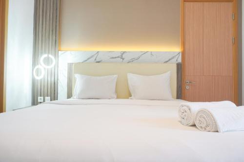 Comfort and Modern Look 2BR at 26th Floor Samara Suites Apartment By Travelio in Jakarta