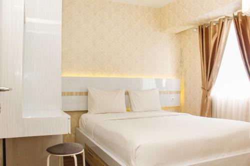 Comfort Living 1BR at Grand Sentraland Karawang Apartment By Travelio in Karawang