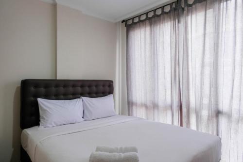 Convenient and Luxurious 2BR Asatti Apartment By Travelio in Pagedangan