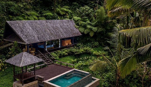 Cozy villa is by lush green landscapes views of hill valley and rice fields in Bali
