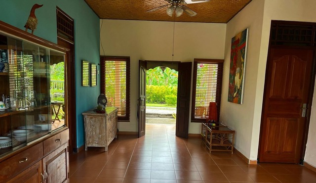 Detached house on beautiful location with direct views of rice fields and sea in Bali
