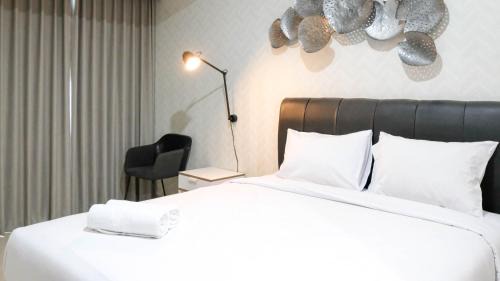 Elegant and Best Choice Studio at Grand Sungkono Lagoon Apartment By Travelio in Surabaya