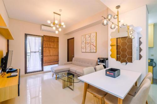 Elegant and Comfy 3BR Transpark Cibubur Apartment By Travelio in Depok