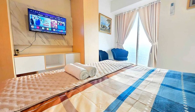 Grand kamala lagoon cozy,cheapset and wifi by LuckyStay in Jawa Barat
