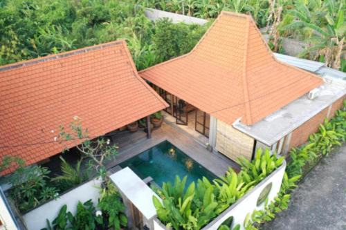 Heliconia Joglo House in Sempidi