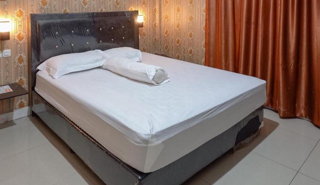 Homestay Singgasana Mitra RedDoorz in Girian
