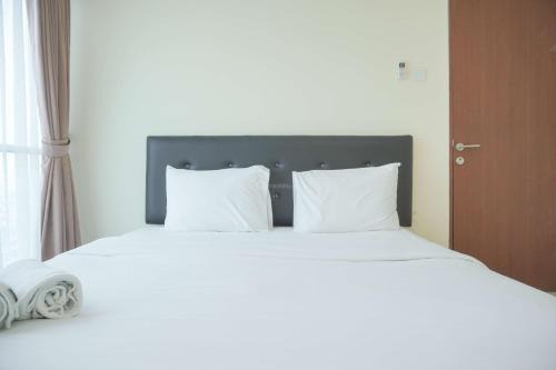 Homey and Comfortable 2BR Tifolia Apartment By Travelio in Jakarta