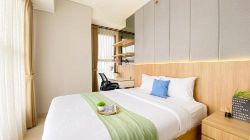 Homey and Good Place 2BR Transpark Bintaro Apartment By Travelio in Tangerang