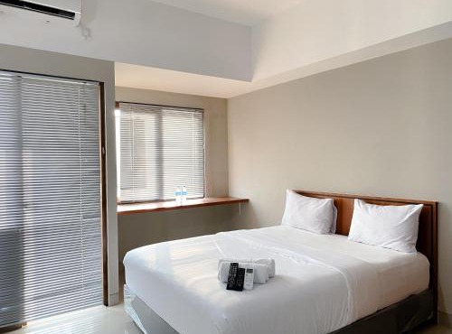 Homey and Minimalist Studio Gateway Park LRT City Jatibening Apartment By Travelio in Bekasi