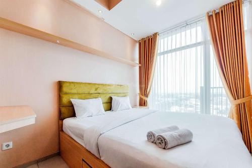 Homey and Modern Studio at Tree Park City Cikokol Apartment By Travelio in Tangerang