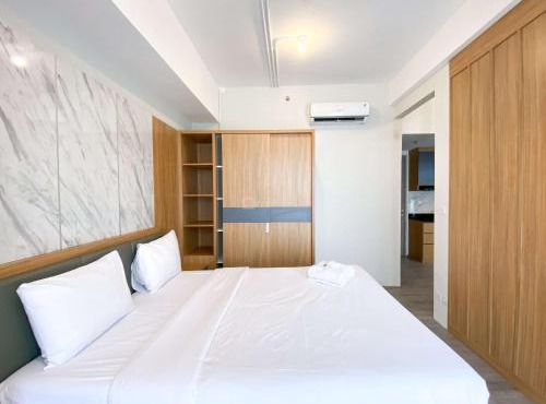 Homey and Spacious Studio Vasanta Innopark Apartment By Travelio in Cikarang