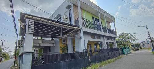 Hotel O Losmen Arkansas Syariah in Sungai Lutus