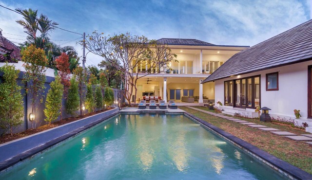 Luxury 10-bedroom private villa estate located in Seminyak, offering daily breakfast, a full-time private chef, airport transfers, complimentary massages, housekeeping, and a dedicated driver. in Badung