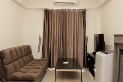 Minimalist and Cozy 3BR at Meikarta Apartment By Travelio in Cikarang