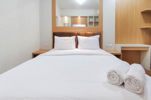 Minimalist and Homey Studio at Amartha View Apartment By Travelio in Semarang