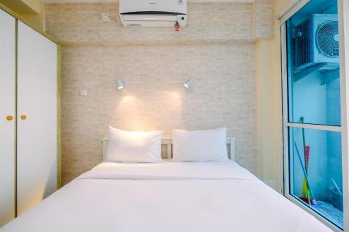Minimalist Studio with Great City View at Tifolia Apartment By Travelio in Jakarta