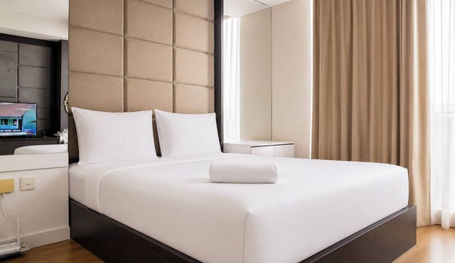Minimalist Warm Studio Room At Apartment Tamansari Skylounge Balikpapan in Balikpapan