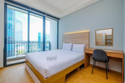 Modern and New 1BR across LRT Station Samara Suites Apartment By Travelio in Jakarta