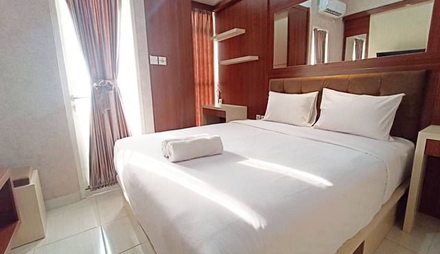 Modern Look And Homey Studio Amartha View Apartment in Semarang