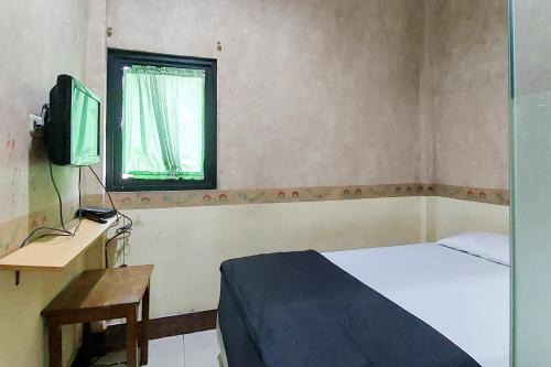 Ni Hotel Syariah Bandara Soekarno Hatta Mitra RedDoorz in Selapajang
