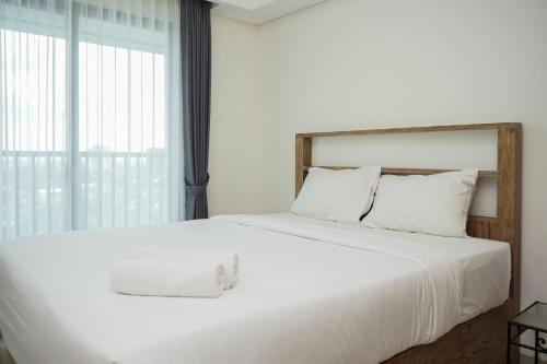 Nice and Homey Studio at Bintaro Embarcadero Apartment By Travelio in Tangerang