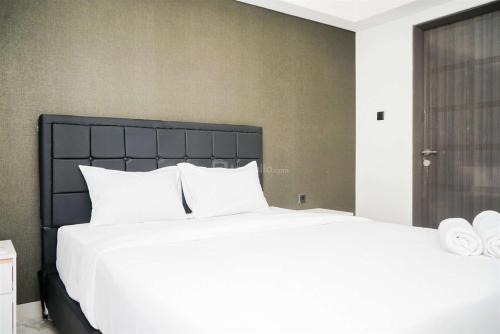 Nice and Restful 1BR Apartment Carstensz Residence By Travelio in Kampung Sawah