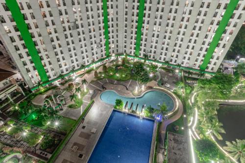 Nusantara Pelangi Rooms By Reccoma in Pondokcabe Hilir