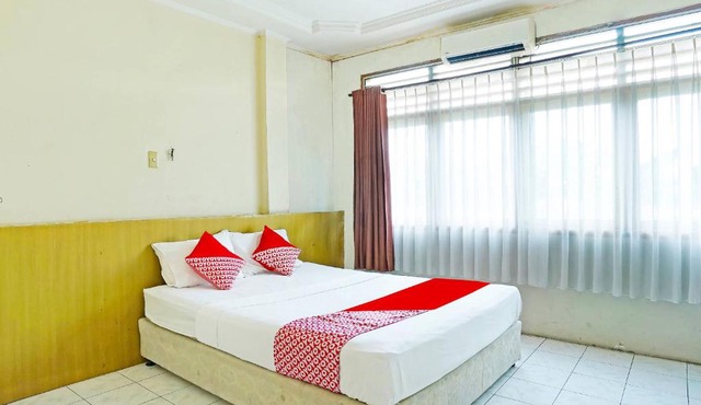 OYO 90390 Hotel Rd Premium in Palembang