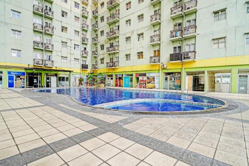 OYO 93426 Metro Suites Apartment By Goodvibes in Bandung