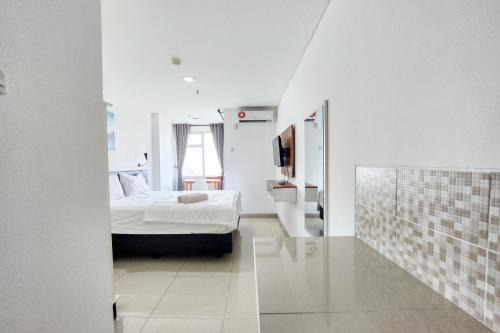 RedLiving Apartemen Enviro - Aurora Rooms in Cibeber