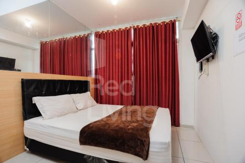 RedLiving Apartemen TreePark City - Hunian Idamanku Tower Alpine in Kebun Nanas