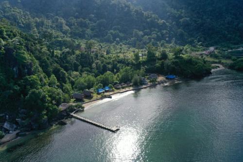 Ricky's Beach House in Pasarsungai-nyala