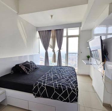 RoomQu at Apartment Tree Park in Kebun Nanas
